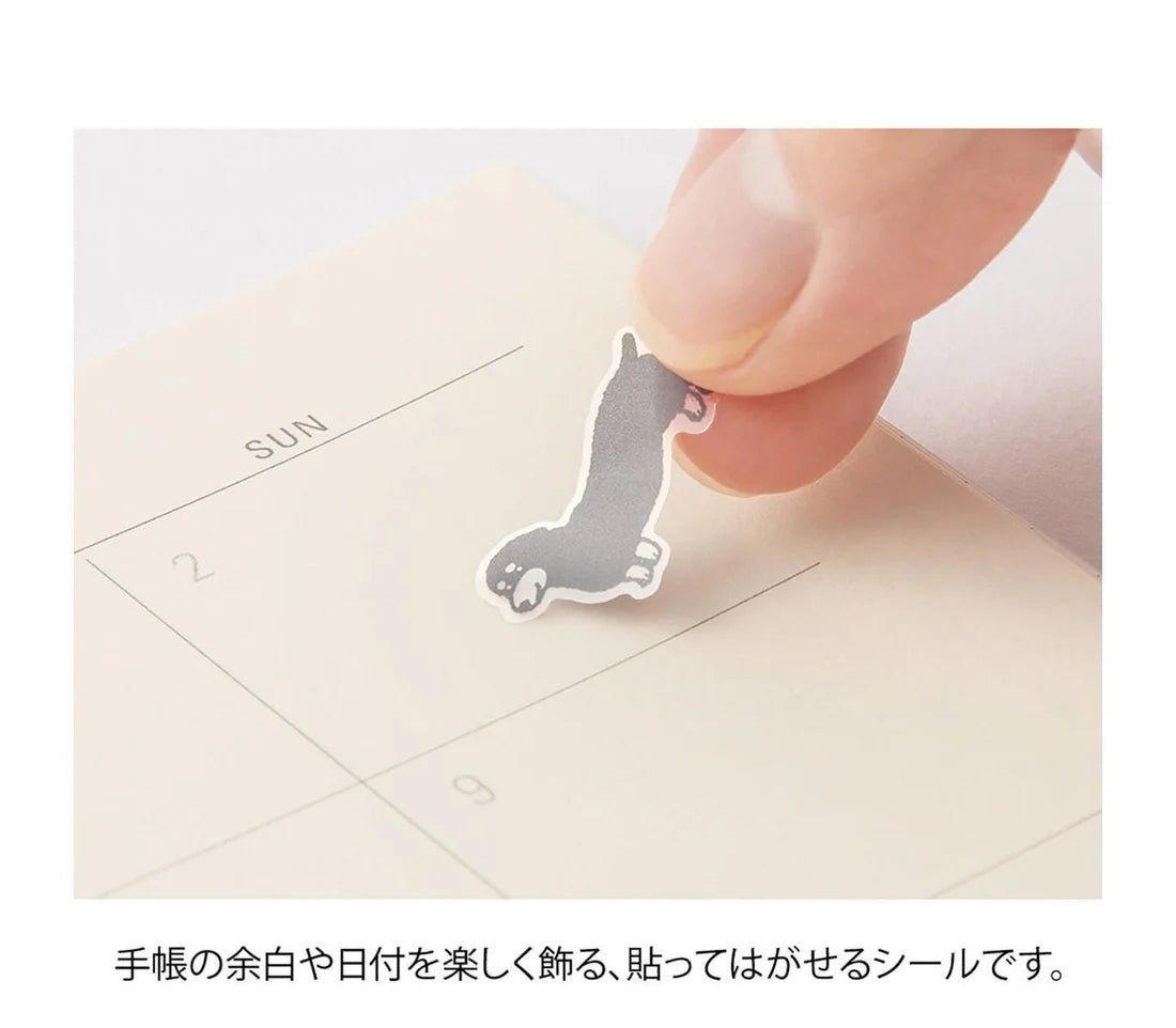 Sticker Midori Chat Dogs removibile applicato su un planner