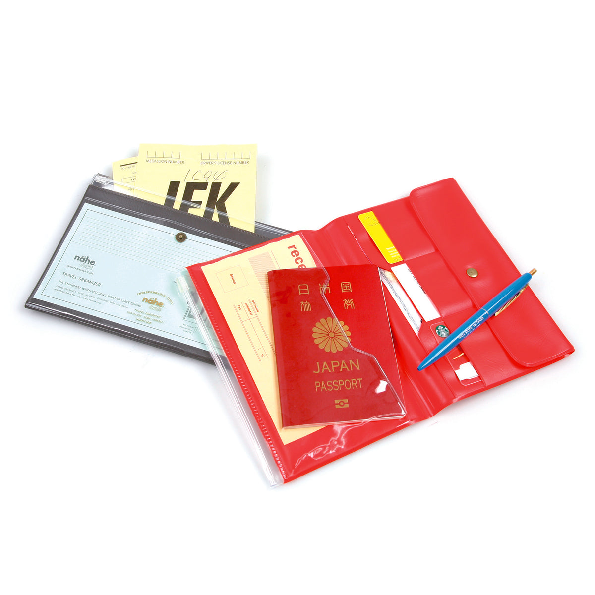 nähe Travel Organizer Rosso aperto con passaporto, carte, documenti e penna